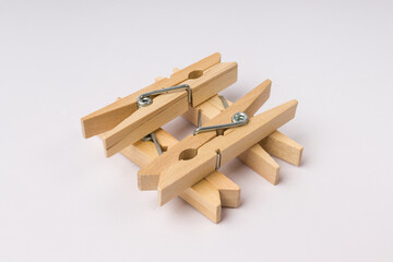 well made of wooden clothespins on a white background