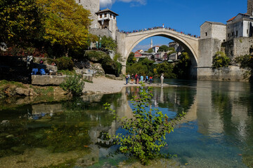 Fototapeta premium Historical Stari Most bridge over Neretva river in Mostar Old town, Balkan mountains, Bosnia and Herzegovina