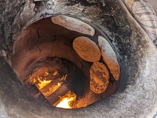 photo of arabic bread bakery with clay oven