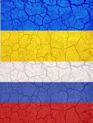 Ukraine and Russia two flags on flagpoles banner on cracked earth background vertical