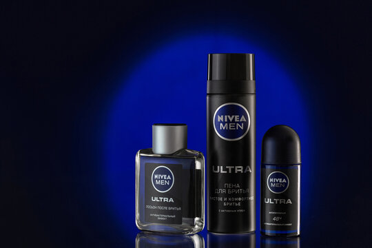 Almaty, Kazakhstan, 01.03.2022 - Set of nivea men cosmetics &ndash; shaving foam, lotion and antiperspirant on dark blue background. Skincare and product photography concept