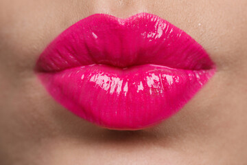 Closeup view of beautiful woman puckering lips for kiss - obrazy, fototapety, plakaty