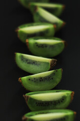 Sliced kiwi in low key	
