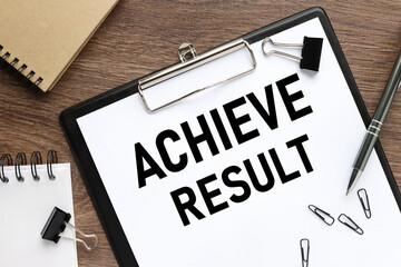 clipboard with white paper. text on paper. ACHIEVE RESULT
