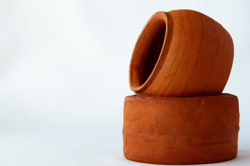 Two pieces of clay on a white background and a copy space. A set of pottery and copy space.