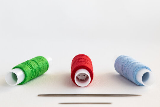 Set of threads and needles for sewing and copy space