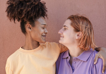 Lesbian couple having tender moment together outdoor