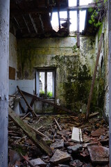 Room in abandoned building with fallen roof