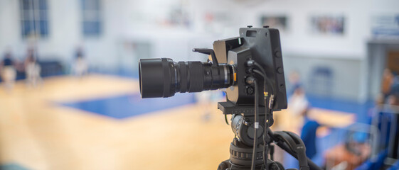 Fototapeta na wymiar tv camera for broadcasting basketball
