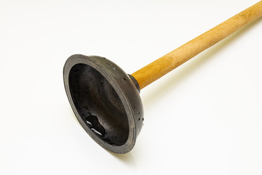 Vantus with a wooden handle lies on a white background