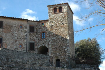 Fototapeta na wymiar Medieval wall and tower in Radda in Chianti , municipality of the Chianti Nero DocCG wine area 