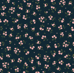 Vintage floral background. Floral pattern with small coral pink flowers on a dark blue background. Seamless pattern for design and fashion prints. Ditsy style. Stock vector illustration.