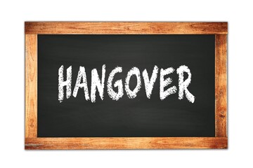 Fototapeta premium HANGOVER text written on wooden frame school blackboard.