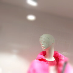 Stylish portrait of a mannequin girl in the window of a women's clothing store. Shopping for women. New fashion.