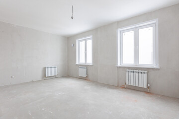 Fototapeta premium interior of the apartment without decoration in gray colors