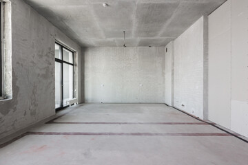 Fototapeta premium interior of the apartment without decoration in gray colors