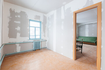 interior of the apartment without decoration in gray colors