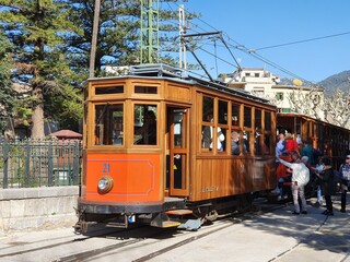 Naklejka na ściany i meble Railcar of the historic tram from Soller to Port de Soller in Soller, Mallorca, Balearic Islands, Spain (F.C. DE SOLLER S.A. = Railway of Soller Society)