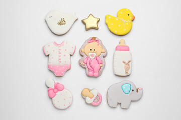 Set of baby shower cookies on light background, flat lay