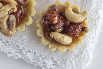 Traditional typical homemade Ramadan sweets with cashews, almonds and pistachios