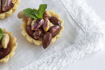 Traditional typical homemade Ramadan sweets with cashews, almonds and pistachios