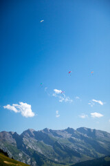 paragliding flight in the mountains. Le Grand-Bornand, France