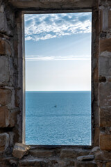 view from the window in an abandoned house on the sea