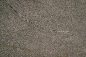 Dark grey stone wall texture . Gray rough backdrop. Stucco surface. Abstract pattern. Texture of natural granite. Abstract art creative background