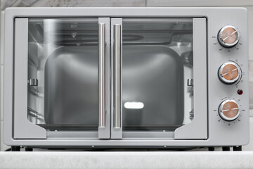 Obraz premium Gray Electric oven appearance. Microwave
