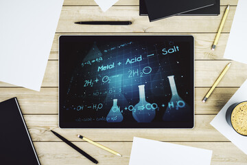 Modern digital tablet monitor with creative chemistry illustration, research and development concept. Top view. 3D Rendering