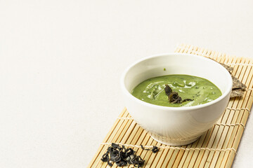 Kelp puree isolated on white background. Healthy superfood from oceanic seaweed
