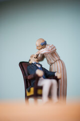 porcelain figure imitating the profession of the dentist and the nurse