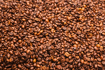 Coffee beans on a white background. Top view.
