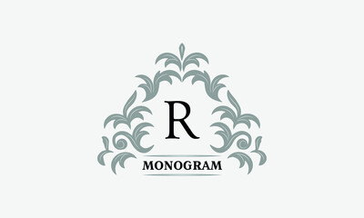 Monogram R. Luxurious floral logo with calligraphic elegant ornament lines. Business sign, identity for restaurant, boutique, cafe, hotel, heraldic, fashion and other vector illustrations