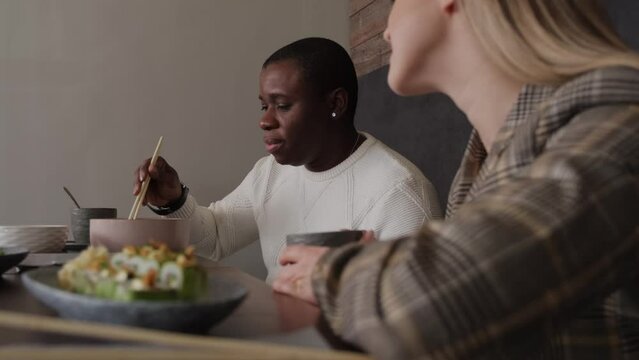 Interracial Friendship in Asian Restaurant