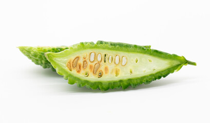 bitter gourd slices isolated on white background, selective focus