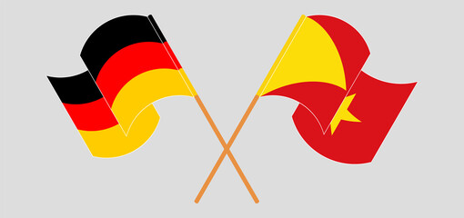 Crossed and waving flags of Germany and Tigray