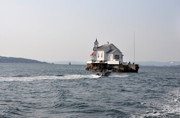 Heggholmen Lighthouse on tiny island in Oslo, Norway