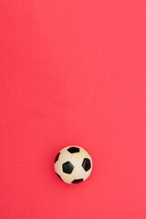 Football and soccer mock up blank template design idea. Black and white soccer ball mockup against pastel pink background. Copy space templates designs for message layout. © KRICAK PHOTOGRAPHY