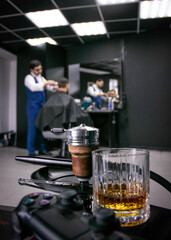  a man gets a haircut in a barbershop