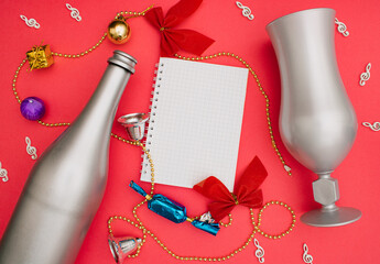 New Year A6 notebook wire binding mock up blank template design idea. Gray bottle, glass, bells,...