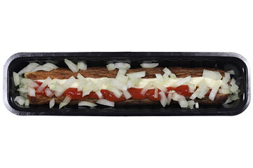 Dutch frikandel speciaal in a black plastic container isolated on white background