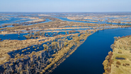 Aerial view flooded forest and fields. The high waters flooded a big area of farm land.