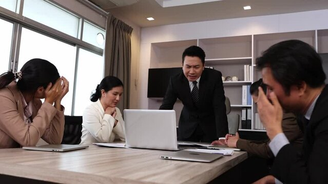 Boss is blaming young women employees about her jobs mistake.