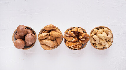 Nuts various in a different bowl. Top view