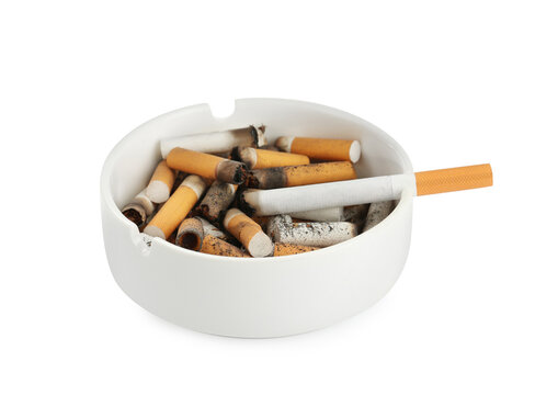 Ceramic ashtray with cigarette stubs isolated on white