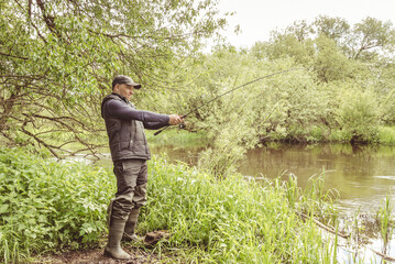 Fisherman on the river bank.