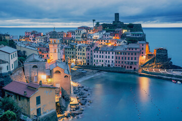view of the town of vernazza at blue hour - obrazy, fototapety, plakaty