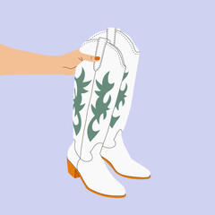 Hand holding a pair of cowgirl white boots. Cowboy girl wears boots. Cowboy western theme, wild west, texas, fashion. Various cowgirl boots. Hand drawn color trendy vector isolated illustration. 