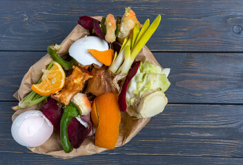 Vegetable and fruit waste from cooking, collected in a garbage bag for recycling. Compost. The...